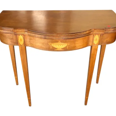 Sale Photo Thumbnail #247: Federal-style mahogany demilune flip-top game table featuring inlay detailing along the apron and tapered legs.