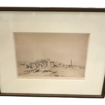 Sale Photo Thumbnail #131: Framed and matted etching depicting a rural landscape with village buildings, housed in a simple dark wooden frame.