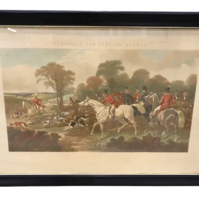 Sale Photo Thumbnail #129: Framed antique Herring's Fox Hunting Scenes print depicting equestrian figures in traditional red coats with hounds, housed in a wide black wooden frame.