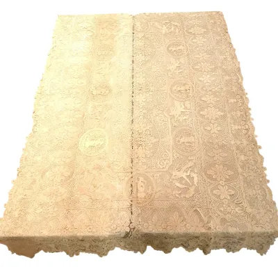 Sale Photo Thumbnail #201: Vintage off-white lace tablecloth featuring intricate floral and pictorial needlepoint panels with scalloped edges.