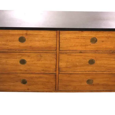 Sale Photo Thumbnail #37: American of Martinsville Campaign-style wood six-drawer dresser featuring brass corner accents, circular brass pull handles, and a dark laminate top surface.
