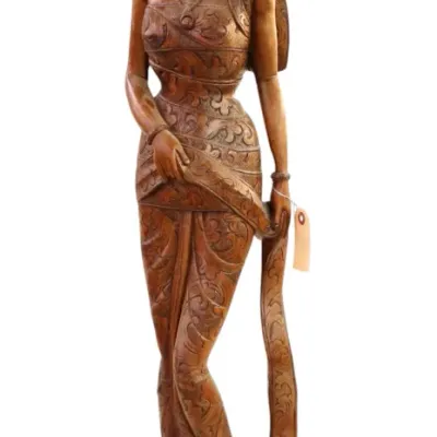 Sale Photo Thumbnail #49: Hand-carved Balinese wood sculpture depicting a dancer in ornate traditional attire, featuring detailed floral carvings and an elaborate headdress.
