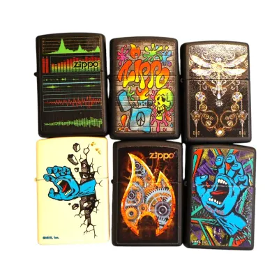 Sale Photo Thumbnail #154: Collection of six graphic Zippo pocket lighters featuring skate art, steampunk, and colorful pop culture designs.