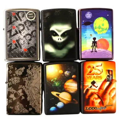 Sale Photo Thumbnail #163: Collection of six modern Zippo lighters featuring sci-fi, alien, outer space, and pop art graphic designs.