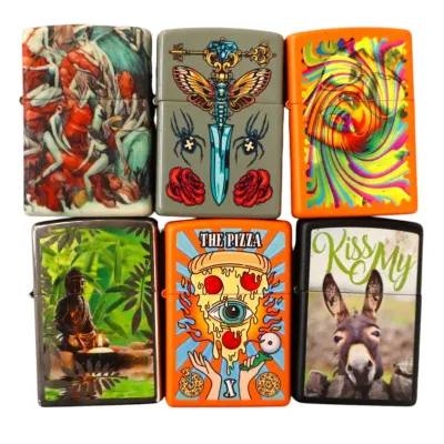 Sale Photo Thumbnail #173: Collection of six novelty Zippo-style lighters featuring colorful graphics, including tarot, psychedelic, and humor designs.