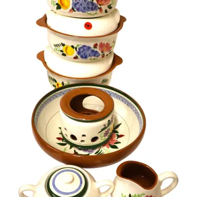 Sale Photo Thumbnail #287: Hand-painted vintage ceramic cookware set featuring a floral and fruit motif, including stacked bowls, a warmer stand, sugar bowl, and cream pitcher.