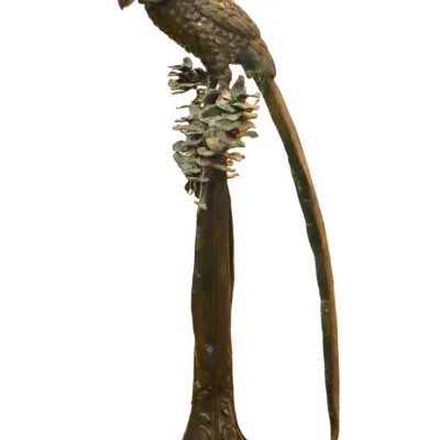 Sale Photo Thumbnail #43: Monumental Phoenix patinated bronze statue featuring a long-tailed exotic bird with a crest perched atop a stylized tree trunk pedestal base.