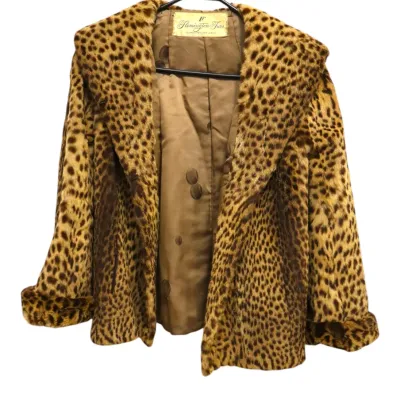 Sale Photo Thumbnail #71: Vintage leopard-print fur jacket by Flemington Furs, featuring a wide lapel collar and satin lining.