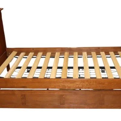 Sale Photo Thumbnail #25: Stickley Mission-style oak daybed frame featuring vertical slatting and an included pop-up trundle unit underneath.
