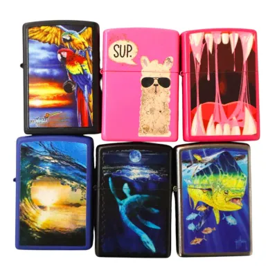 Sale Photo Thumbnail #174: Collection of six Zippo-style lighters with novelty printed graphics, including wildlife, sea life, and pop culture designs.