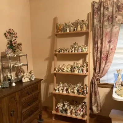 Sale Photo Thumbnail #5: An extensive collection of porcelain angel figurines, 