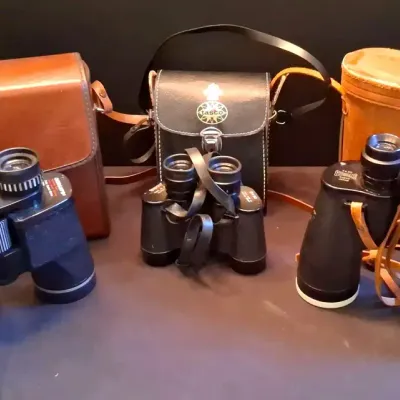 Tasco, Oshman's and Yoshida & Co. Binocular Collection With Carrying Cases