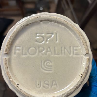 Sale Photo Thumbnail #20: Bottom detail of a vintage Floraline McCoy ceramic planter, showing the '571 FLORALINE USA' maker's mark.