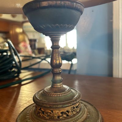 Sale Photo Thumbnail #26: Vintage brass table lamp with an ornate filigree base and verdigris patinated stem.
