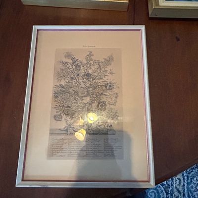 Sale Photo Thumbnail #79: Framed botanical print featuring a detailed floral bouquet illustration labeled 'November,' set in a light wood frame with a pink inner accent.