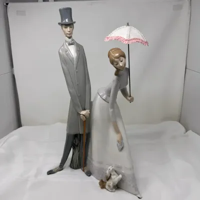 Elegant Lladro Porcelain Victorian Couple with Parasol and Dog Figurine