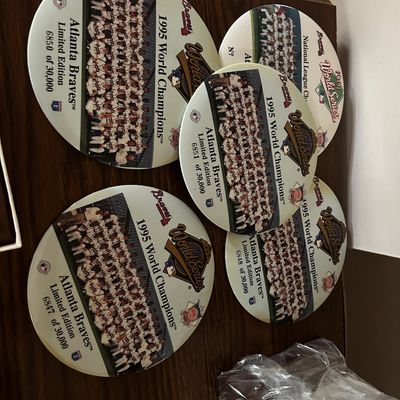 Sale Photo Thumbnail #137: Set of five limited-edition Atlanta Braves baseball commemorative ceramic plates, featuring the 1995 World Champions team photo.