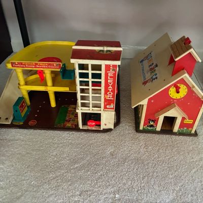 Sale Photo Thumbnail #189: Vintage Fisher-Price Little People play sets, including the Parking Ramp Service Center #930 and Play Family Schoolhouse #923, circa 1970s.
