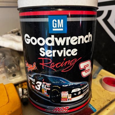 Sale Photo Thumbnail #147: Vintage GM Goodwrench Service Racing #3 Dale Earnhardt metal popcorn tin featuring iconic black Monte Carlo graphics.