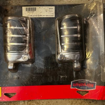 Sale Photo Thumbnail #72: Pair of Kuryakyn Switchblade male mount footpegs in original clamshell packaging.