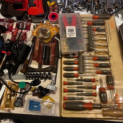 Sale Photo Thumbnail #2: Large collection of hand tools and hardware accessories, including an HDX 70-piece screwdriver set, wrenches, power tool attachments, and electrical hardware.