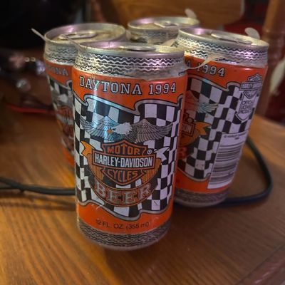 Sale Photo Thumbnail #110: Four-pack of vintage Harley-Davidson Daytona 1994 commemorative beer cans in the original plastic ring holder.