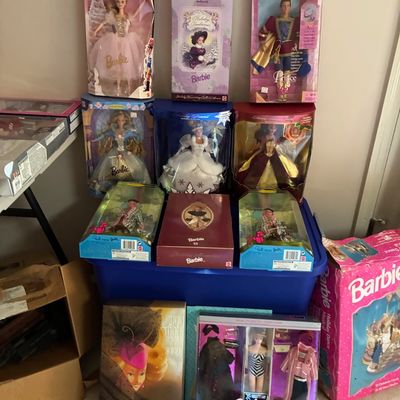 Sale Photo Thumbnail #195: Collection of vintage NIB Barbie dolls, including Holiday Traditions, Prince, and 35th Anniversary editions.