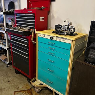 Sale Photo Thumbnail #37: Vintage teal and off-white medical rolling cart displayed alongside a red Craftsman stackable tool chest.