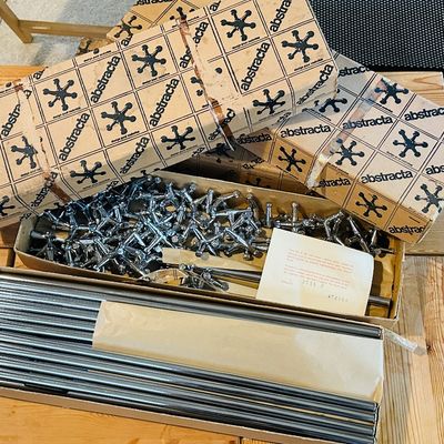 Sale Photo Thumbnail #31: Vintage Abstracta modular display system components in original boxes, including metal tubes and chrome connectors designed by Poul Cadovius.
