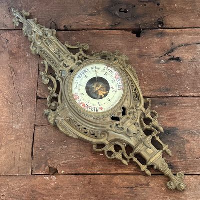 Sale Photo Thumbnail #30: Antique French ornate cast brass wall-hanging barometer with rococo scrollwork details.