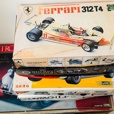Sale Photo Thumbnail #216: vintage scale model car kits, including Protar Ferrari 312 T4, Aoshima 1937 Rolls Royce, Nichimo, and Heller Citroen kits.