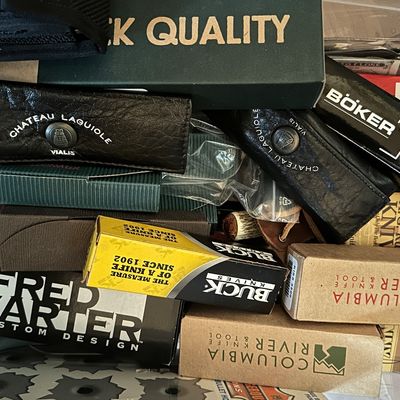 Sale Photo Thumbnail #51: Collection of boxed pocket knives and leather sheaths from brands including Buck, Böker Plus, Chateau Laguiole, Fred Carter, and Columbia River Knife & Tool.