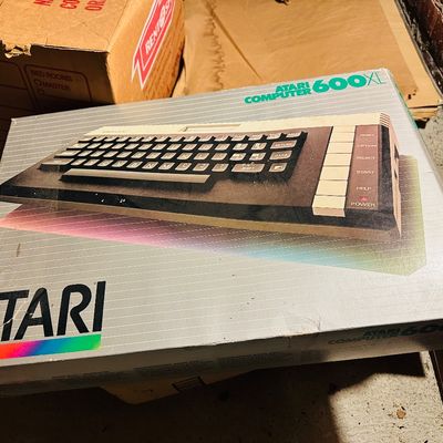 Sale Photo Thumbnail #189: Vintage Atari 600XL home computer system in its original box, circa 1983.