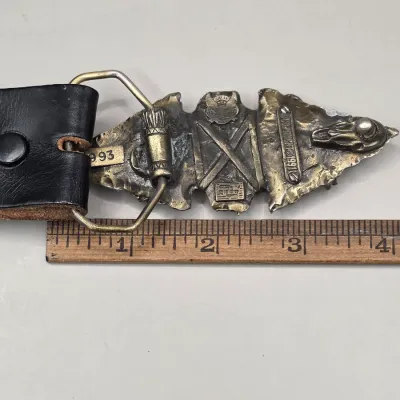 LOT 28: Vintage Wooden Jewelry Box, Wooden & Leather Boot Jack, 36" Leather Bolo Ties, Embossed Leather Belts w/Buckles & More