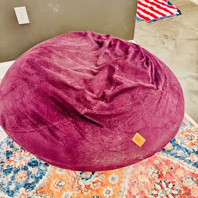 Sale Photo Thumbnail #36: Large purple CordaRoy's convertible bean bag chair with a textured plush cover.