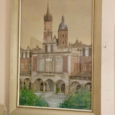 Sale Photo Thumbnail #232: Framed vintage painting depicting St. Mary's Basilica and the Cloth Hall in Kraków, dated 1928 and signed lower right.