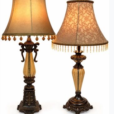 Sale Photo Thumbnail #17: Pair of ornate traditional table lamps with dark resin bases, fluted light-toned urn columns, and beaded-fringe bell lampshades.