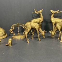 Sale Photo Thumbnail #27: Collection of vintage brass decor items, including cat figurines, a deer family, turtles, a miniature bucket, and an apple container.