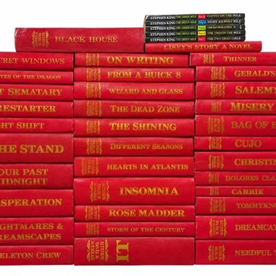 Sale Photo Thumbnail #11: Large collection of red faux-leather bound Stephen King hardcover books, including a set of paperback installments of The Green Mile.