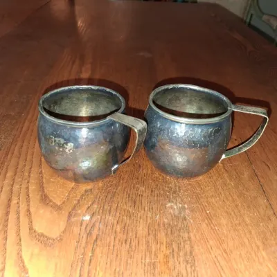 Sale Photo Thumbnail #544: Pair of vintage hammered silver plated mugs