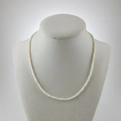 Sale Photo Thumbnail #677: Single strand cultured pearl necklace with k gold clasp