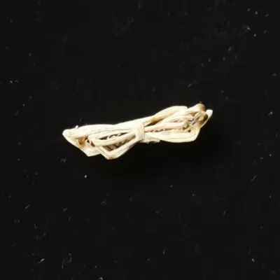 Sale Photo Thumbnail #695: Vintage gold bow brooch