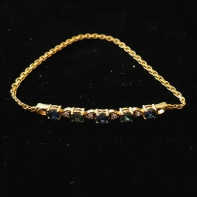 Sale Photo Thumbnail #686: Vintage at t k gold service award bracelet
