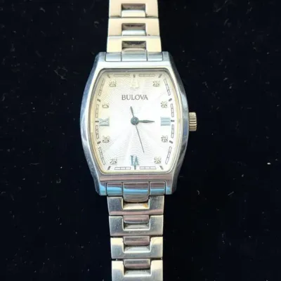 Sale Photo Thumbnail #646: Bulova women s diamond accent tonneau watch p