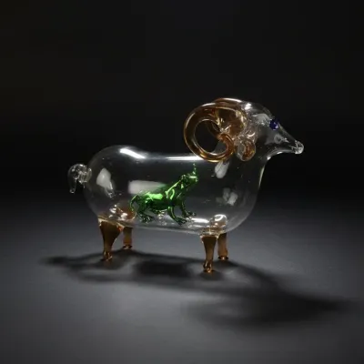 Sale Photo Thumbnail #610: Mid century italian glass ram figurine with internal animal
