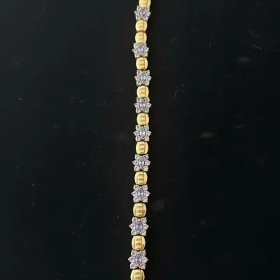 Sale Photo Thumbnail #662: K yellow gold and diamond cluster tennis bracelet