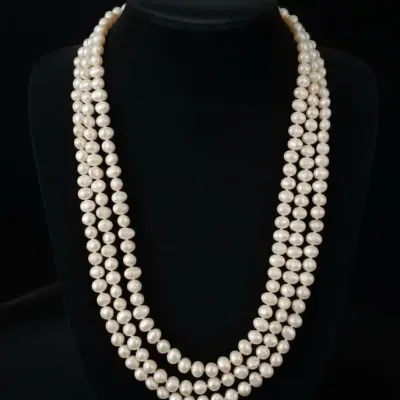 Sale Photo Thumbnail #681: Triple strand pink freshwater cultured pearl necklace