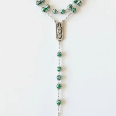 Sale Photo Thumbnail #653: Irish celtic cross rosary with green iridescent beads