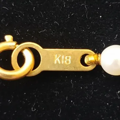 Sale Photo Thumbnail #676: Single strand cultured pearl necklace with k gold clasp second image