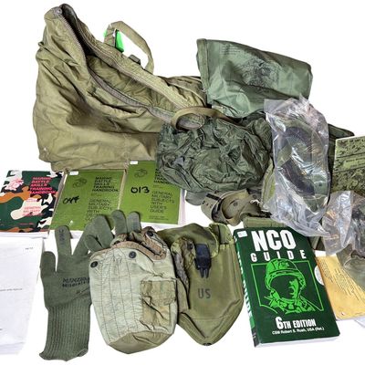 Sale Photo Thumbnail #691: A Collection of Late 20th Century US Marine Corps and US Army Field Gear and Manuals